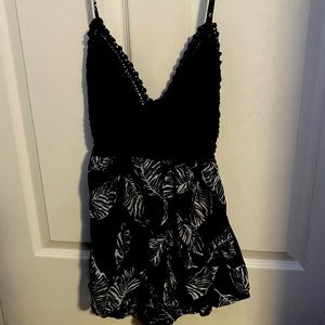 Size small black and white shein romper.